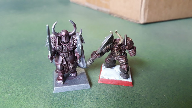 Khorne Warriors - still needs some work. Have vague recollections I may have used a Secret Weapon ruby wash in some of the recesses (others were all definitely AP inks over a metallic primer) so may need to play with these a little...