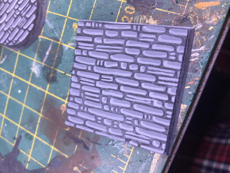 Base with a single broad highlight on the bricks