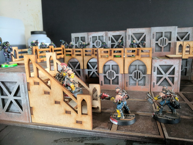 Another nice feature is the stairs are pretty much functional with enough of a flat area and gap to sit miniatures on both size bases.