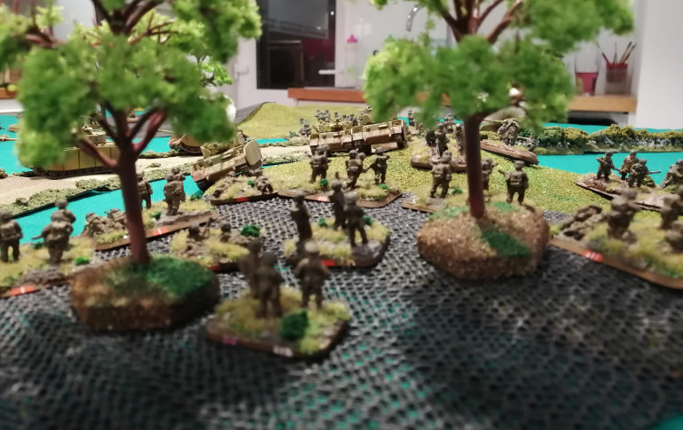 The view from the perspective of the Sherwood Forresters in the trees as the Panzers move up