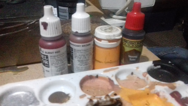 The sequence of paints I used for my rust drybrush, this was followed by a wash of Strong Tone