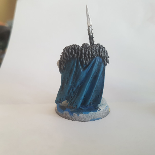 The Fur was Painted with a 50/50 Mix of Army Painter Dungeon Grey and Army Painter Matt White. The Cloak was Painted with Temple Guard Blue