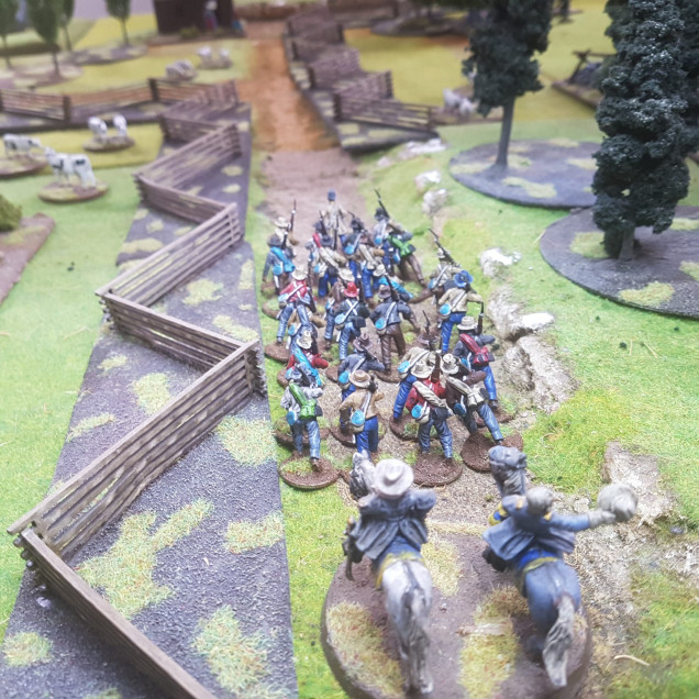 Captain Williams Leads his Southern Boys Down the Sunken Road to Oppose the Yankees Opposite them.