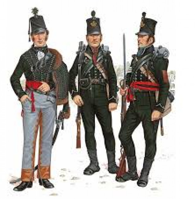 On the left is a Rifle Officer. Note the Leather Reinforces Breeches, Pelisse (Tight Fitting Jacket Worn Slung on the Shoulder like a Hussar), Red Sash that Denotes an Officer, Curved Sabre used by Flank Companies and Light Infantry and the Black Shoulder Strap that has a Whistle in it for Signalling.          Centre: Rifleman. The Black Facings (Cuffs and Collar) Mean that this Rifleman is a Member of the 95th Rifles. The 60th Royal Americans would have Red Facings.            Right: Sergeant. Notice the Same Red Sash as the Officer but with a Black Section, the Colour of the Regiment's Facings. Also Note that the NCO wears a Rank only on the Right Arm. This was also True of the Famous 