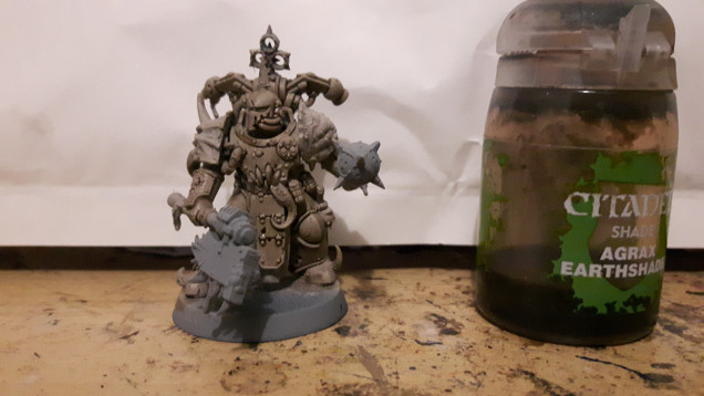 I gave him a reasonably heavy wash of Agrax Earthshade.