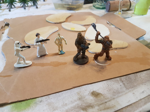 Is it right to over piant a few Kinder Suprise starwars figures from 1997 as cheap stand ins for the even cheaper cardboard tokens suplied in the base Imperial Assault box?