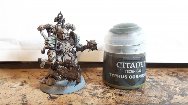 Apply Typhus Corrosion to the metal. Don't worry about being too neat.