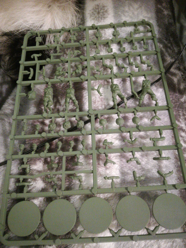 Priming the British infantry in army painter's army green as it's similar to so of the webbing I've seen, hopefully this will make it easier for mum to paint as its less fiddely?