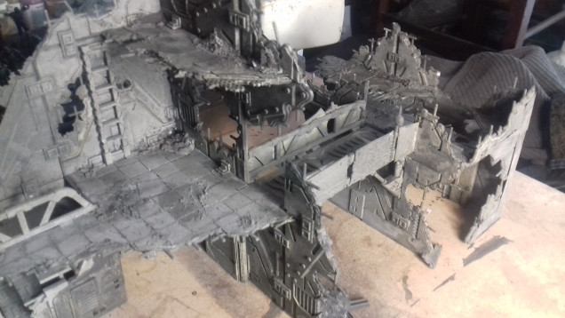 I am really pleased now that the whole thing has been undercoated as the building to my eyes looks like a building and not like a collection of plastic squares. I need to touch up a couple of areas where white is still showing through, and then I can start drybrushing and adding detail.