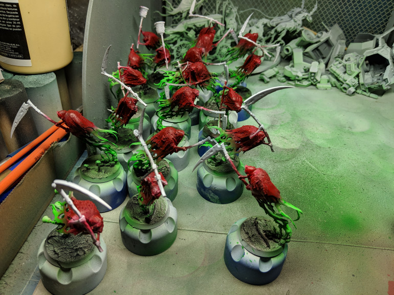 Gloss varnish on the grayish cloaks and a crimson ink worked wonders