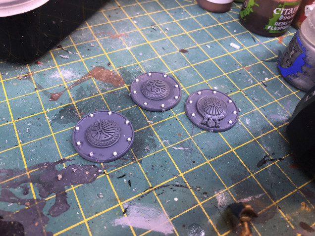 The second half of my cavalry idea, dwarf shields, bolt action bases, and some plasticard rivets.