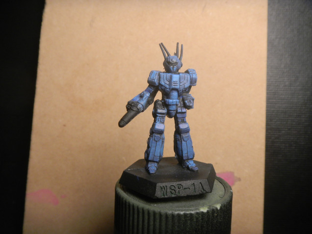 Drybrushed base of  ultramarine blue, highlight electric blue and edge with voidshield blue 