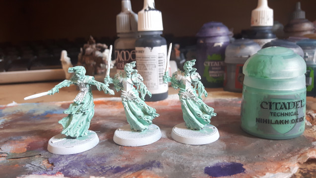 All I've done to them so far is spray them white and apply a coat of Nihilakh Oxide to everything that isn't supposed to be metal.