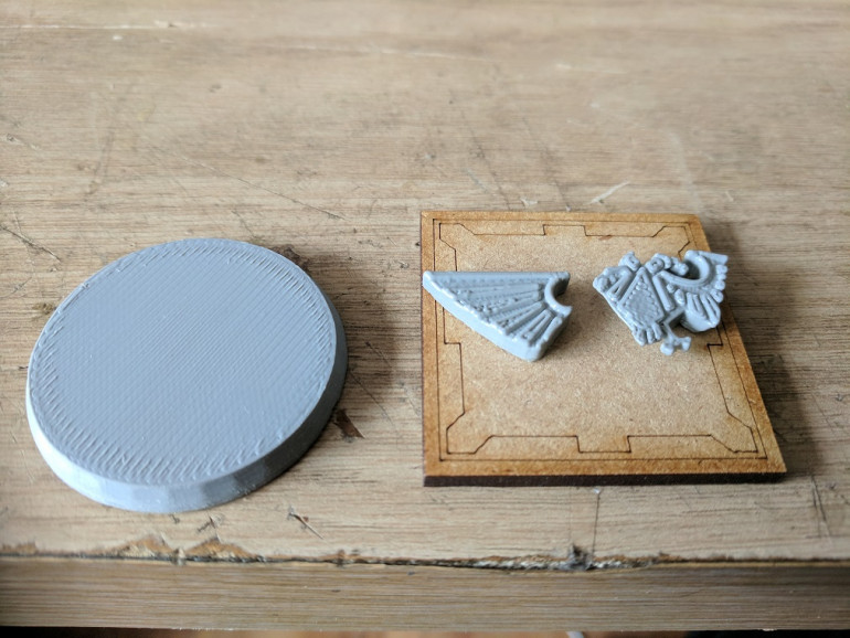 the base components after printing, i decided to print the sections off as separate pieces to give me the freedom of placing the body and wings in the best position.