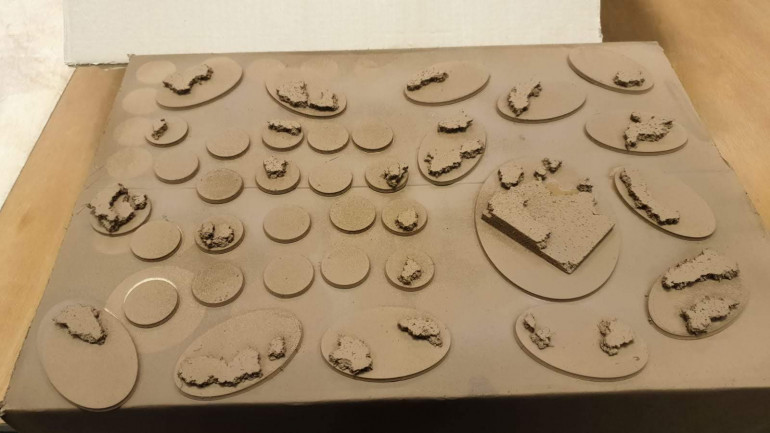 Some 3D printing later and I have the rest of my bases, I then added some bits of cork and primed them with the awesome Army Painter Leather Brown