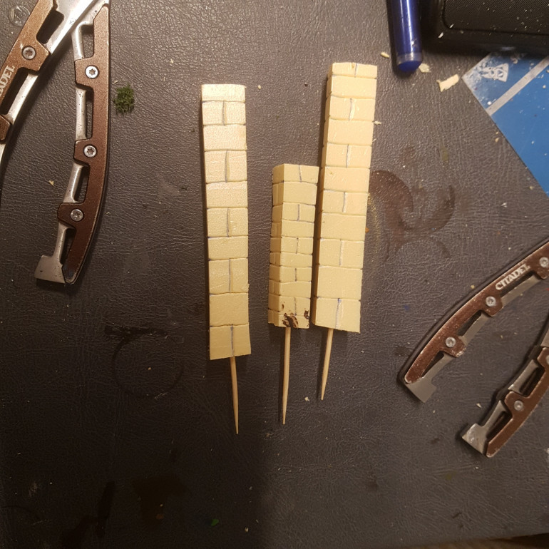 I took some Off Cuts and Scored Rough Bricks into them.