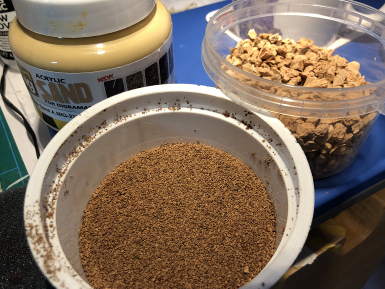 The base building materials: cork granules, mix of modelling sand and acrylic sand paste