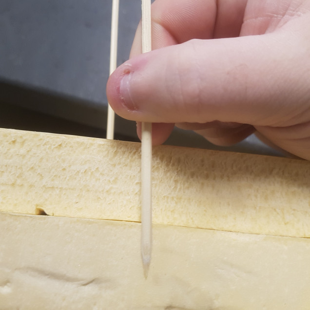 To Secure the Two Pieces and Prevent Splitting Skewers were Inserted into the Foam. The Skewers were Measured as Seen in the Picture before Sticking them in so they Did Not get in the Way of the Knife. 