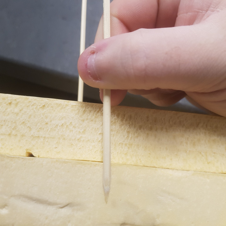 To Secure the Two Pieces and Prevent Splitting Skewers were Inserted into the Foam. The Skewers were Measured as Seen in the Picture before Sticking them in so they Did Not get in the Way of the Knife. 