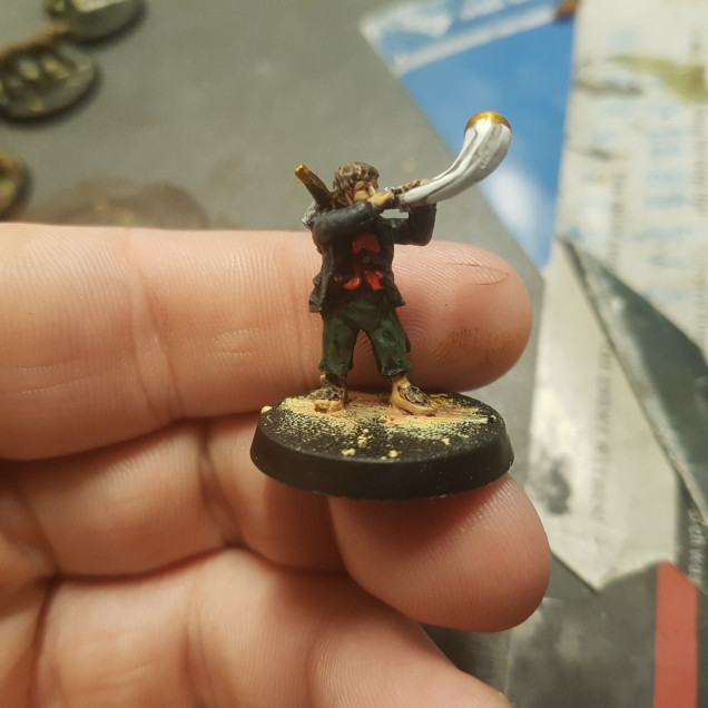 A Hobbit Archer with a Signal Horn. In Game it's a Warhorn and Has the Honour of Being the Very First Warhorn of it's Kind Coming out in 2004 almost a Decade Before any Others