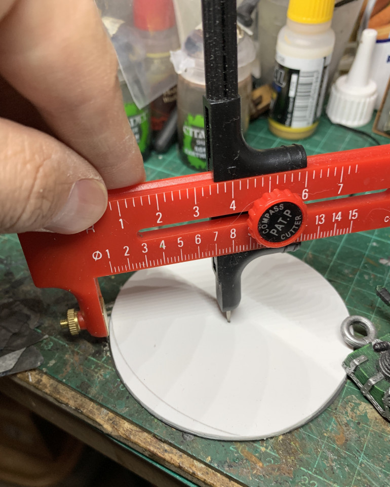 Cutting bases from foamed PVC with circular cutter. It takes many passes to cut through, but you get perfect circles and in any size.