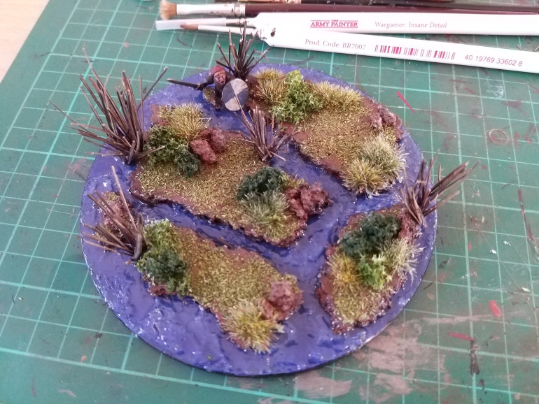 I added woodland scenics water effect waves to the base (again as I had some left over) and sprayed with water so it smoothed it out slightly