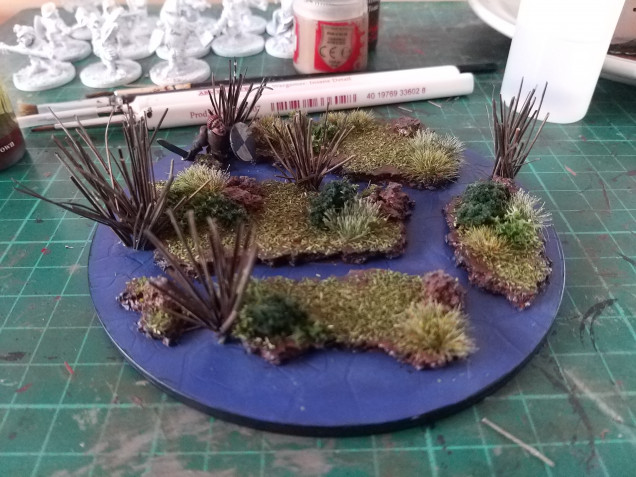 I wanted the soldier a little hidden and the foliage wasn't really enough so I added some reeds I made from part of an outdoor broom (Don't tell my wife)