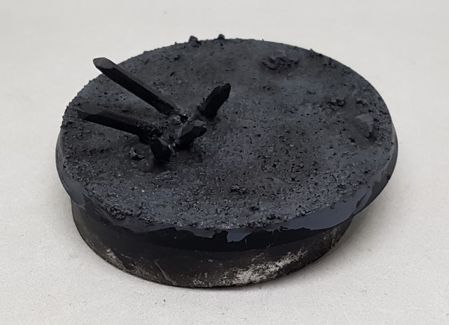 Then I mixed up some GW Nuln Oil with water and applied this in patches over the base, focusing on areas that would have more shadow.  Once dry, more was then applied evenly all over the base, with the jppe that the hard edges around the first wash would be less clearly defined but some areas would still be darker than others.