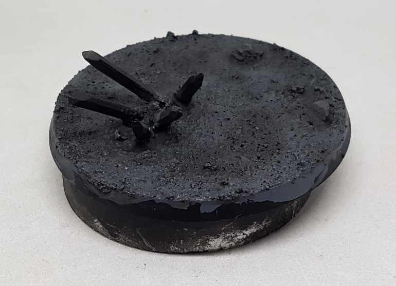 Then I mixed up some GW Nuln Oil with water and applied this in patches over the base, focusing on areas that would have more shadow.  Once dry, more was then applied evenly all over the base, with the jppe that the hard edges around the first wash would be less clearly defined but some areas would still be darker than others.