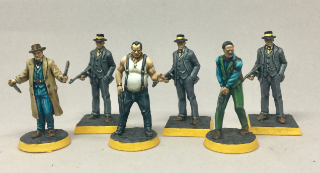 Don Marsullo, with his undershirt, suspenders, and shotgun may be my favorite mini in the box—although the severed horse head is a close second. While there are still two families to go, this means I have the three I need for game night tonight. 