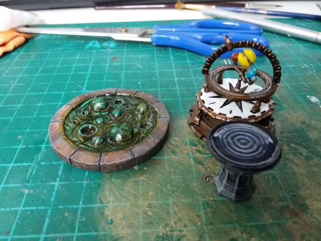 Pensieve and Orrery from Mantic and a bubbling pool of something from Oathsworn minis