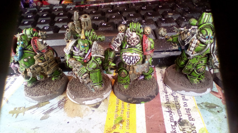 I started by painting them Death Guard Green which came with a Conquest Magazine