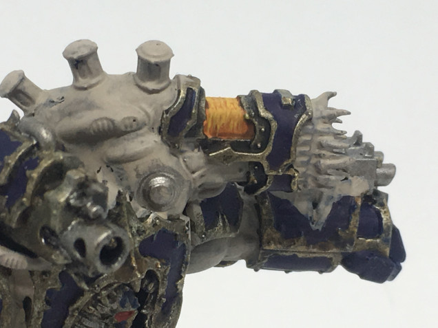 Do a final highlight with Flash Gitz yellow or yriel yellow, it just needs to be lighter or brighter than the previous paint, continuing the technique from the coils as per the above linked video