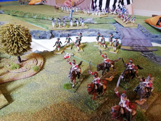 Dragoons fallback over the bridge and rally for one more charge 