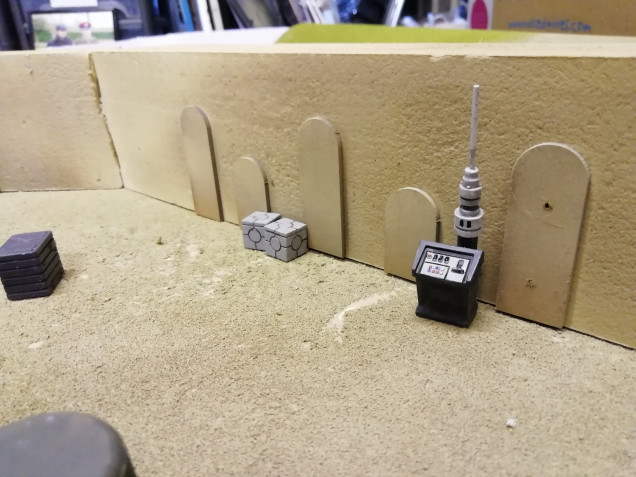 space port wall made from a bit of foam with some MDF cut offs stuck on.