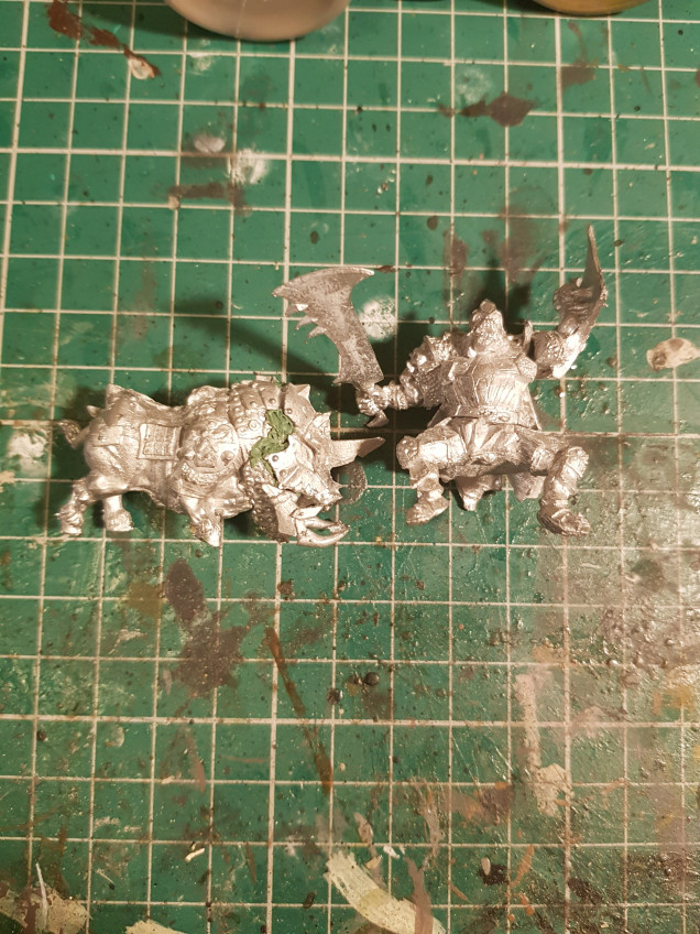 The orc krudger from Mantic is a big bit of lead... 