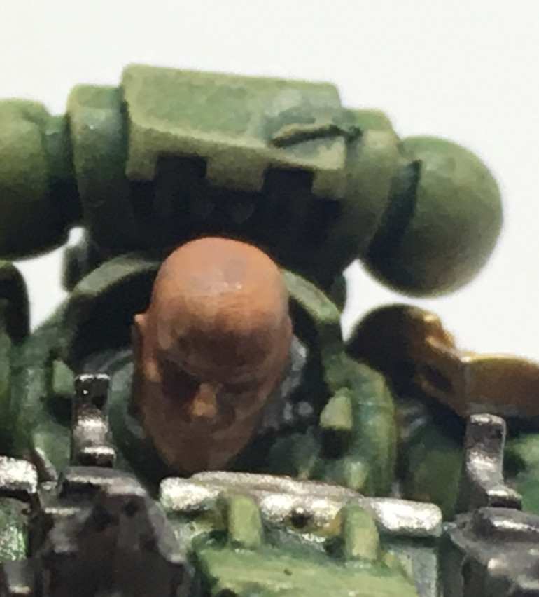 Apply some very faint and spraying edge highlights with Kislev Flesh