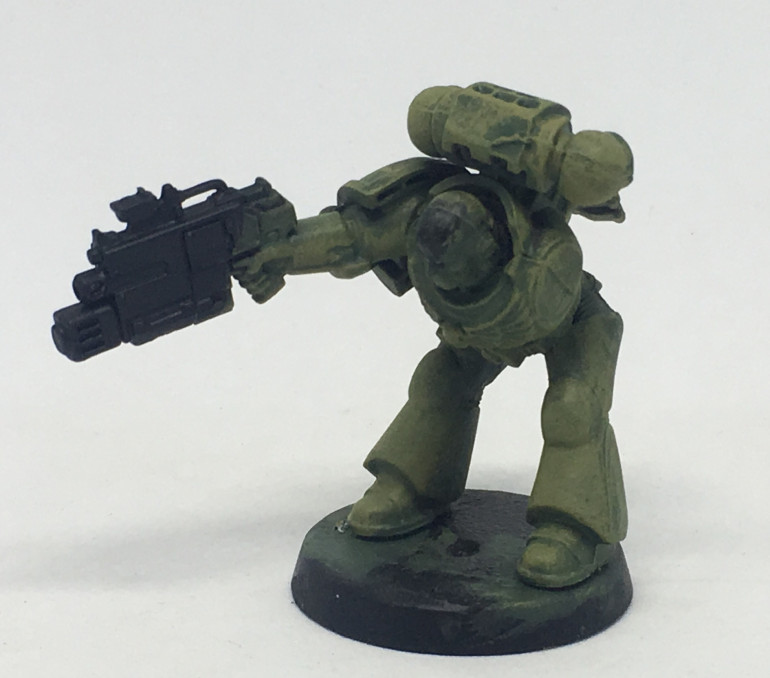 Wash the model with Bile Tan Green citadel Shade