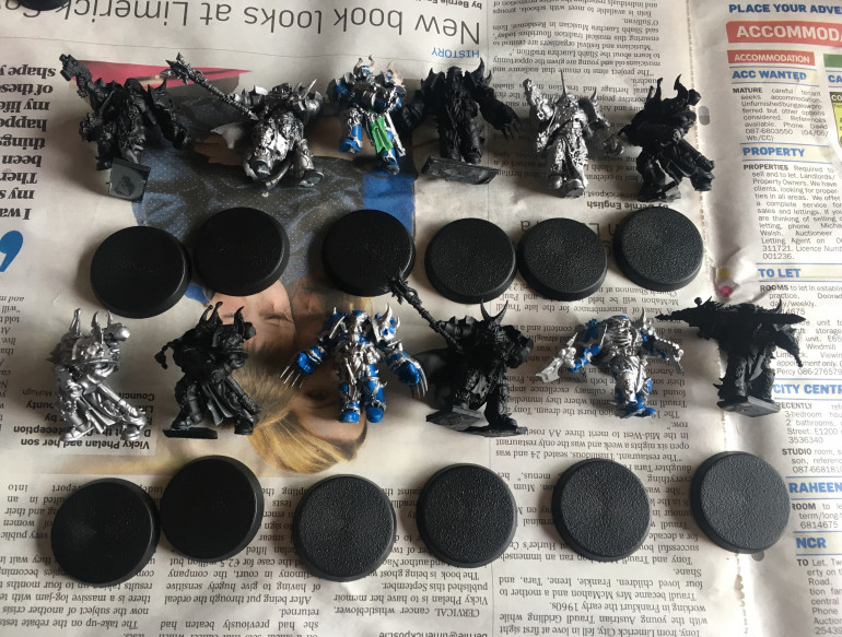 Some of these models were intended to be done as Alpha Legion. The bases were sprayed Chaos Black.