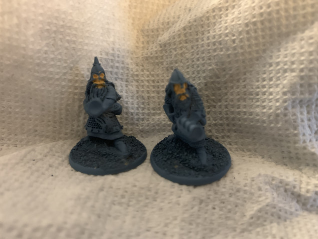 The handgunners only have two poses and they’re wearing gloves so pretty much we’re just painting the faces. Because of the dark primer, it’ll probably take two light coats. 