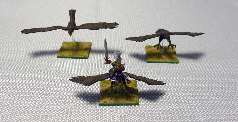 My eagles stood on round bases. The bases were removed and replace by 50 mm square bases.