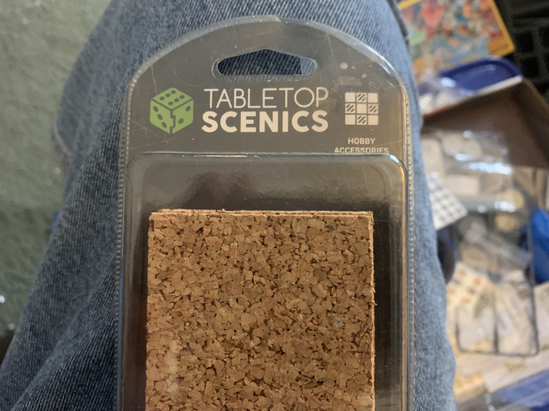 I had some cork from Tabletop Scenics that I decided to make into some rocks. 