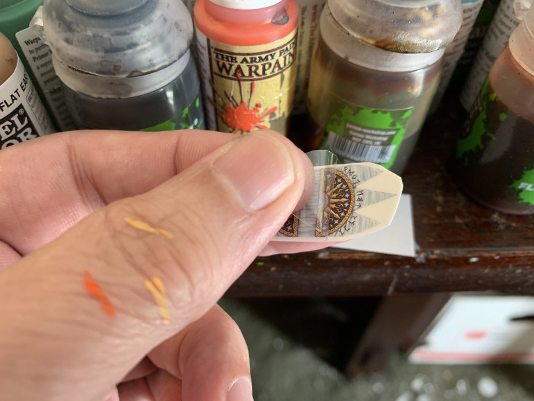 The transfer is protected by a thin plastic cover. You’ll need to carefully peel it off.