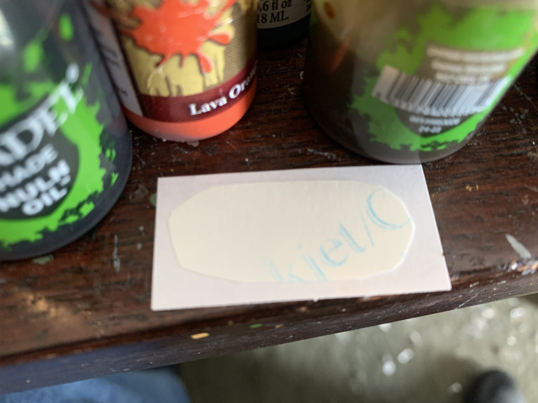 The now exposed transfer has a sticky surface. Place it sticky side down on the paper. Then press down making sure there are no air bubbles.