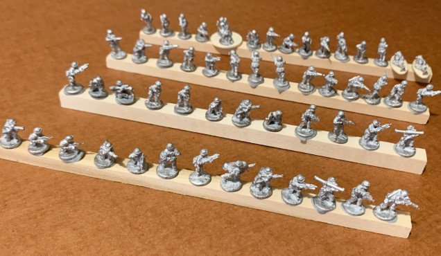 Also started the Marine Infantry.  They give you 55 figures in all.  Needed quite a bit of cleaning, But I will say I can recognize details like the H-Harness 782 gear, M249 SAWs, M203 GLs under some of the M16A2 service rifles, etc.  Ready for prime and base coating.