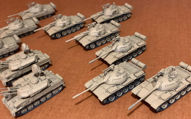 I've made three of the T-54s with side skirts, three without (the 1991 Gulf War saw a mix of these).  I also made three of them as Chinese Type 59 IIs (Iraq had about 1500 of these in service for the war).