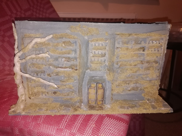Bit of spare time to return to my temple build. My home made tree looks like a facehugger stuck on the side but never mind. First layer of flock down.