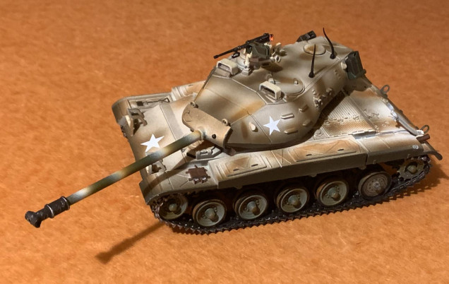 Okay, first patient.This 1:32 (54mm approx? 11 inches long) M41 Walker Bull Dog tank I bought at Historicon for just $10 ... because it was completely missing a rear road wheel and the .50 cal was broken off its pintle.