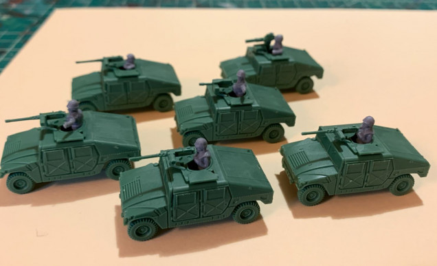 The Ryan's Leathernecks kit comes with six of the older-model HMMWVs.  I made one with the TOW ATGW, one with the Mark 19 Automatic grenade launcher, and the rest with the redoubtable .50 M2HB heavy machine gun. 