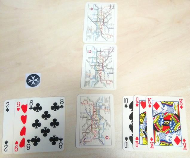 Three chase cards are drawn from the pack and set face down. Player 1 would keep initiative from the unsuccessful Escape Phase and will chose, before checking his hand of 3 cards, whether the pattern will be Higher, Lower, Higher or Lower, Higher, Lower.